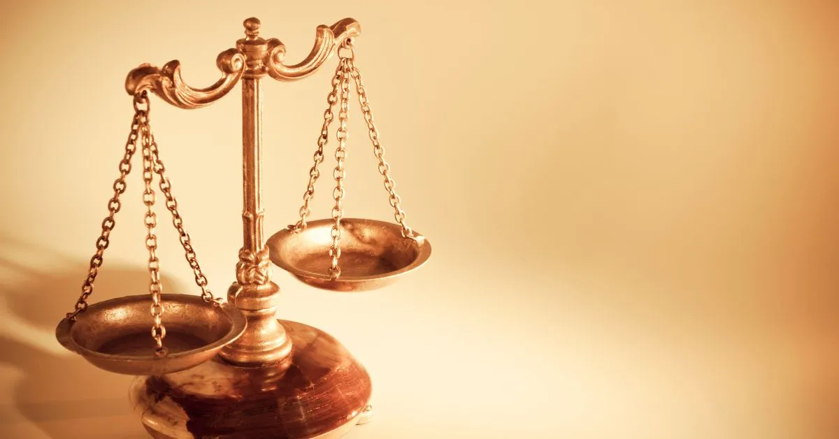 Perda de uma chance no Direito Civil representada por balança da justiça simbolizando indenização por oportunidade perdida